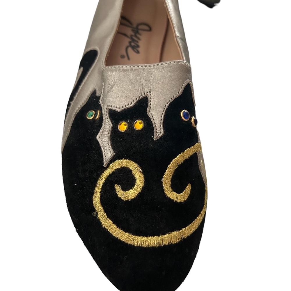 Adorable flats with black cat appliqués on a metallic background